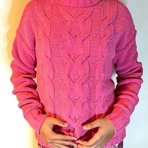 Soft tube pink sweater cozy feel to it looks great with Jeans.